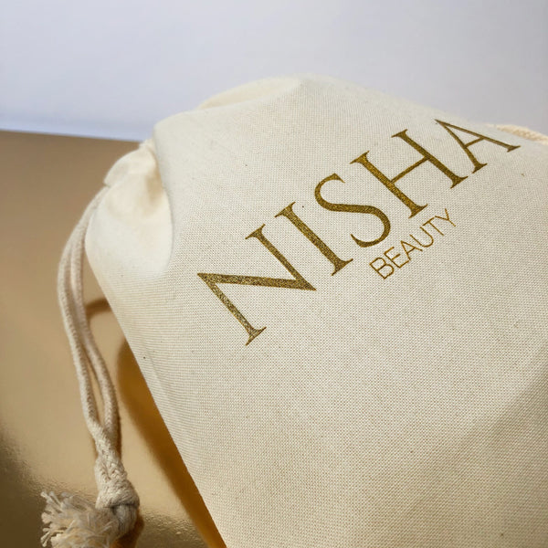 pochon de rangement Nisha Beauty soin anti pelliculaire ayurvedique